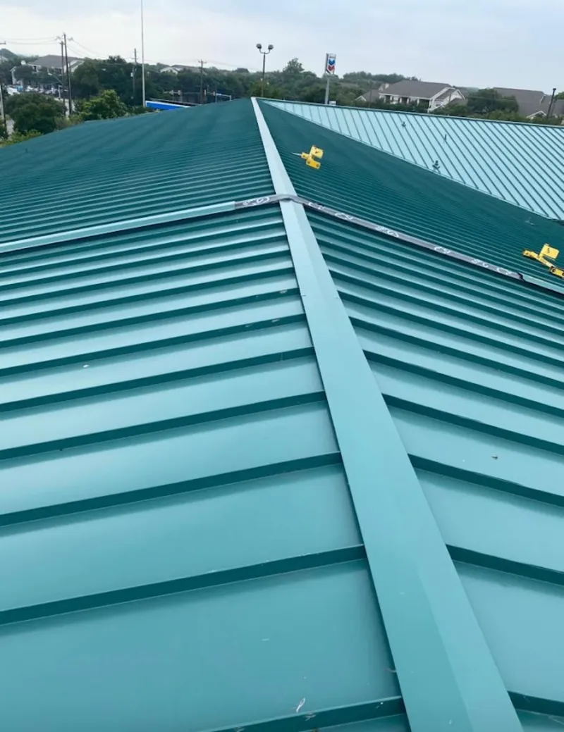 Green commercial metal roof ridge and valley for Metal Roof Repair in East Foothills